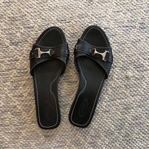 Tod’s black leather sandals with buckle